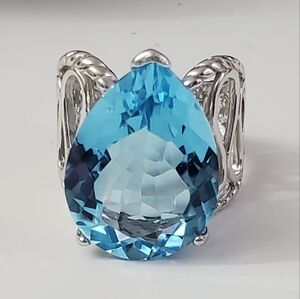 Watch Video / 16 Cttw Solitaire Sterling Silver 925 Solitaire Blue Topaz Ring